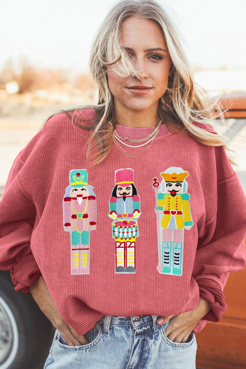 Strawberry Pink Chenille Nutcracker Doll Graphic Christmas Corded Sweatshirt