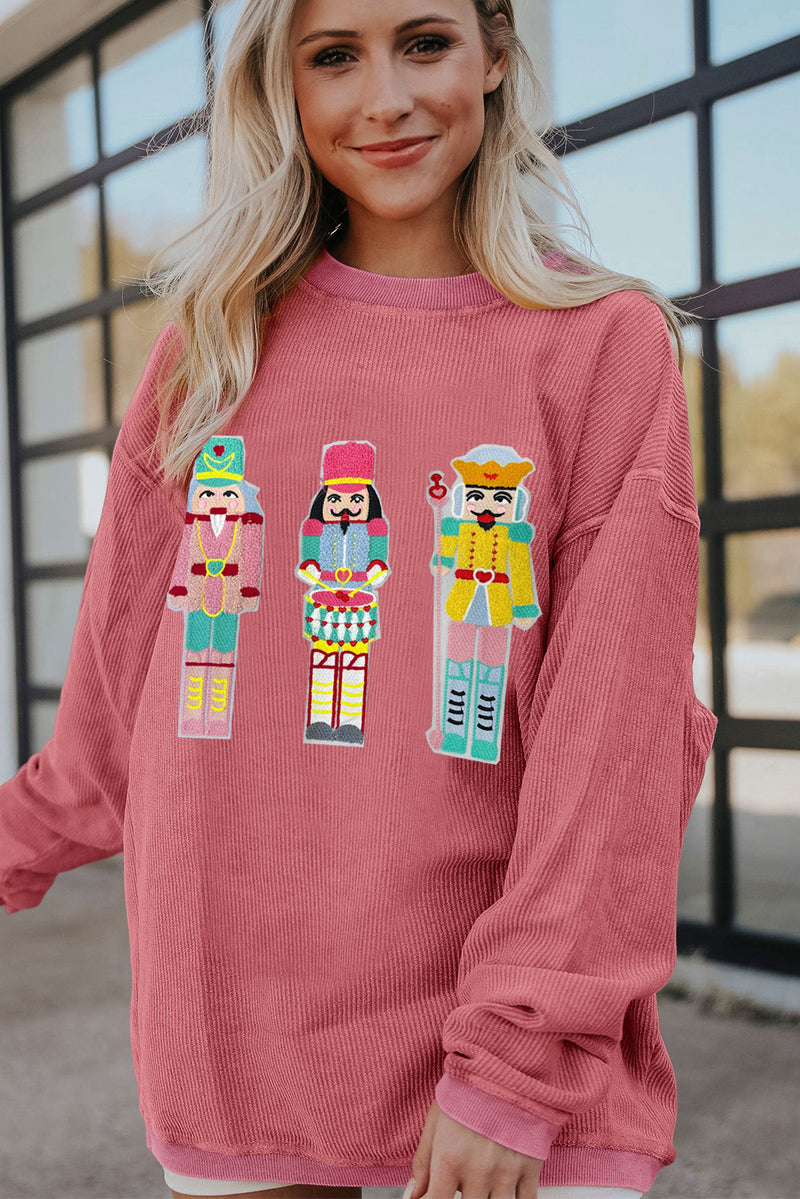 Strawberry Pink Chenille Nutcracker Doll Graphic Christmas Corded Sweatshirt